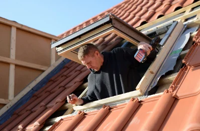 Pose de fenêtres de toit Velux à Y